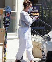ashley-tisdale-chats-on-her-phone-while-making-a-coffee-run-at-maru-coffee-in-los-angeles-020822_8.jpg