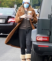ashley-tisdale-stays-warm-in-a-brown-winter-coat-a-beanie-and-uggs-while-making-a-coffee-run-in-los-feliz-california-080123_6.jpg